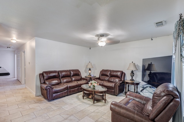 living room featuring ceiling fan