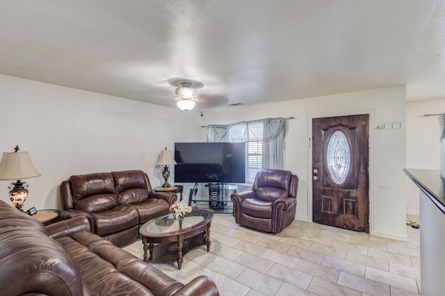 living room featuring ceiling fan