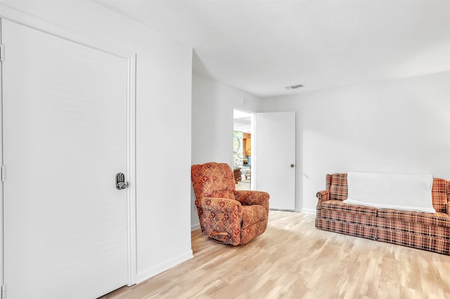 living area with light wood-type flooring