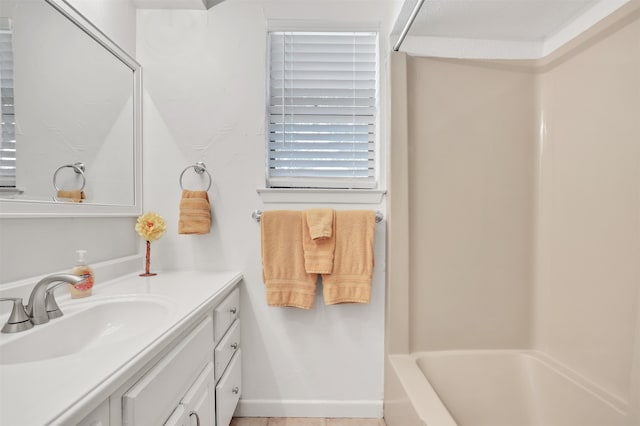 bathroom featuring vanity and shower / bathtub combination