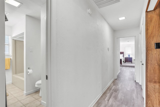 hall featuring light hardwood / wood-style floors