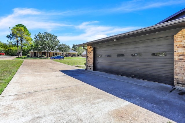 garage with a yard