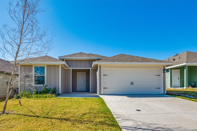 ranch-style home with a front yard and a garage