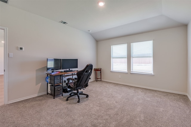 office area featuring carpet and vaulted ceiling