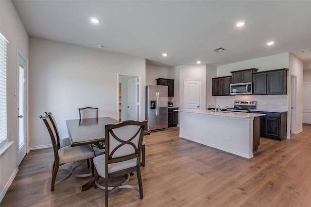 dining area with dark hardwood / wood-style floors