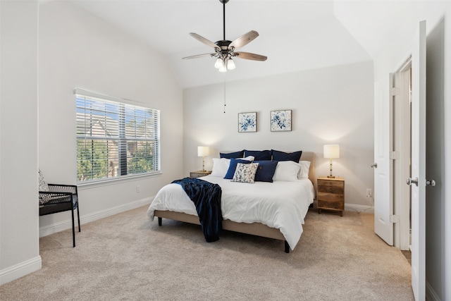 bedroom with lofted ceiling, light carpet, and ceiling fan