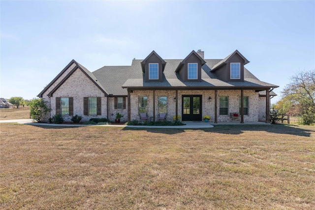 view of front of house with a front lawn