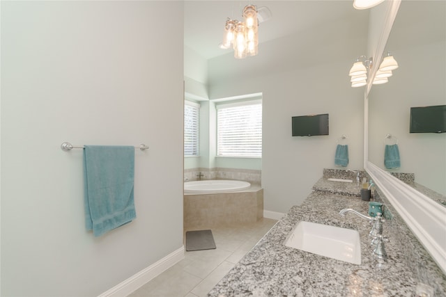 bathroom featuring vanity, a chandelier, tile patterned floors, and tiled bath