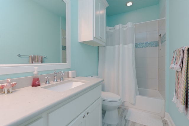 full bathroom with vanity, toilet, and shower / bath combo