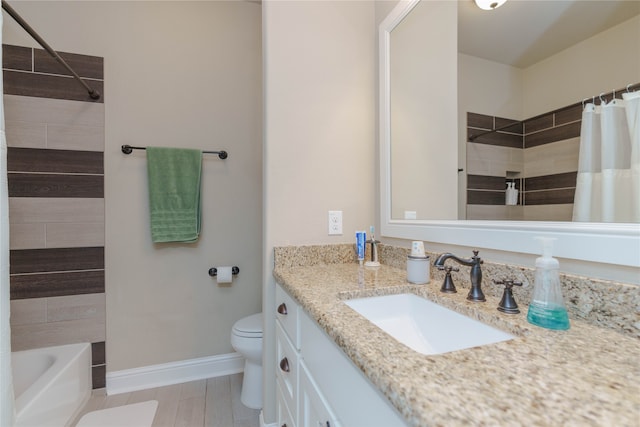 full bathroom featuring vanity, toilet, hardwood / wood-style flooring, and shower / bathtub combination with curtain