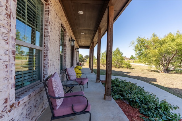 view of patio featuring a porch