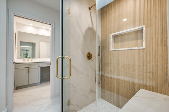 bathroom with vanity and an enclosed shower