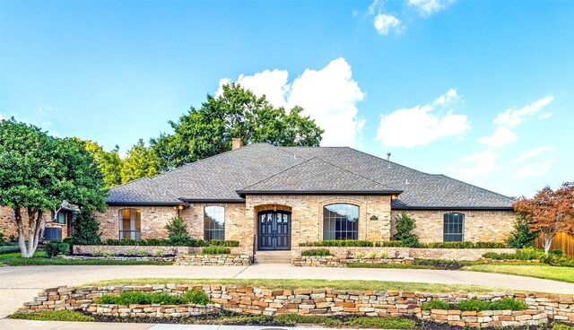 view of french country style house