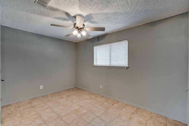 unfurnished room featuring a textured ceiling and ceiling fan