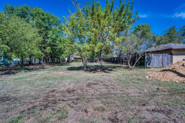 216 W Marshall St, Palmer, TX 75152 - view of yard featuring fence