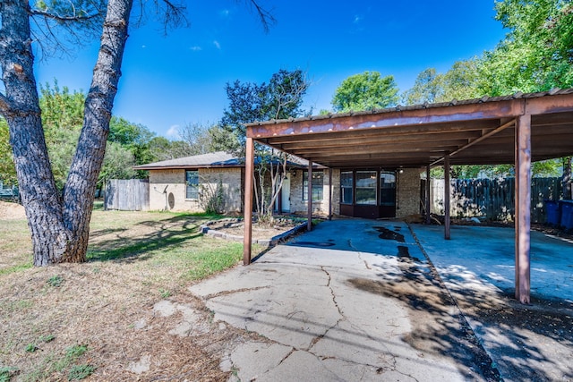 view of front of house featuring a carport