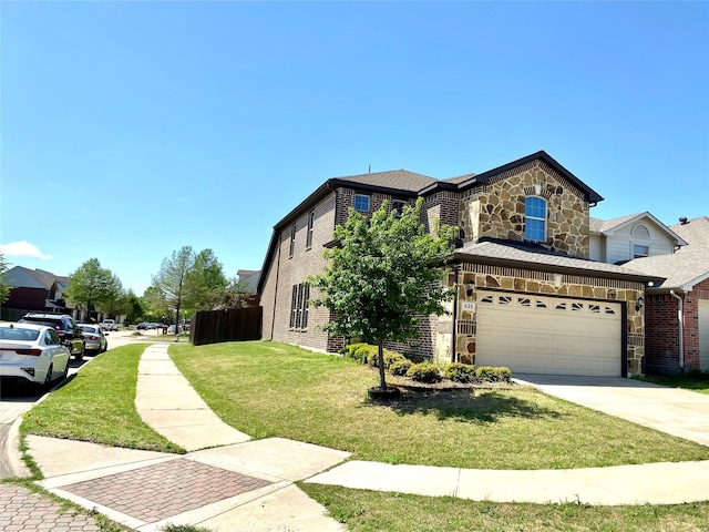 view of front facade featuring a front lawn and a garage