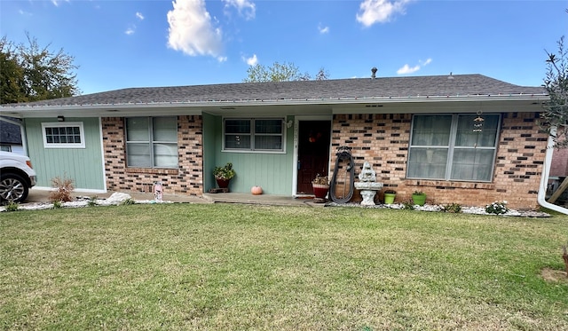 single story home with a front yard