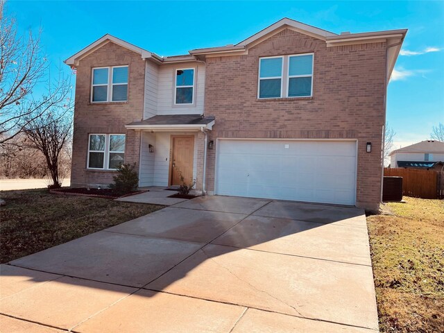 multi unit property featuring a garage