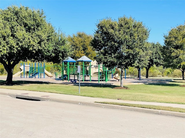 view of playground with a yard