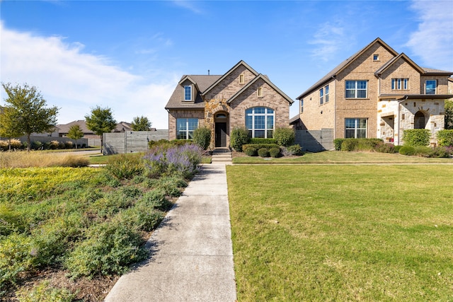 view of front facade with a front yard