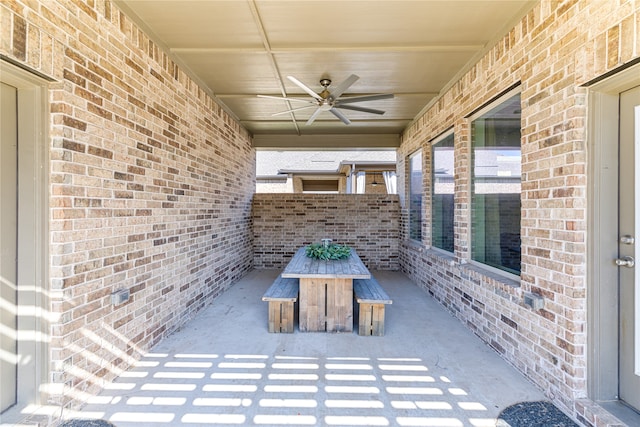 view of patio / terrace featuring ceiling fan