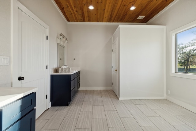 bathroom with wooden ceiling