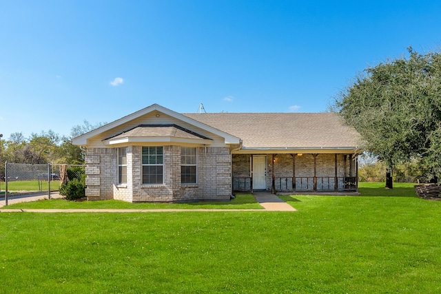 back of house featuring a lawn