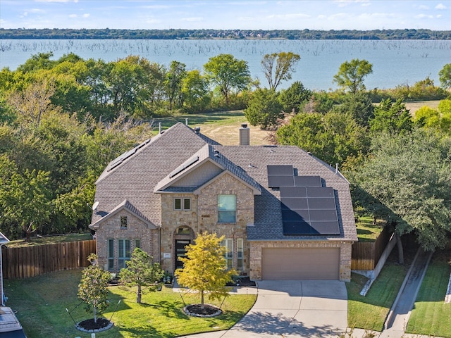 drone / aerial view with a water view