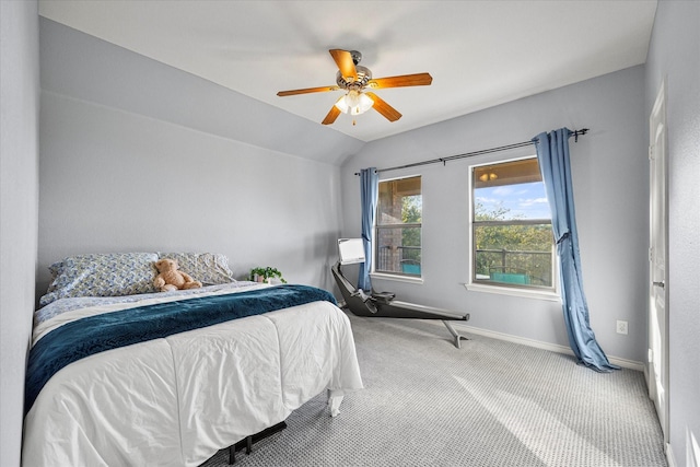 carpeted bedroom featuring lofted ceiling and ceiling fan