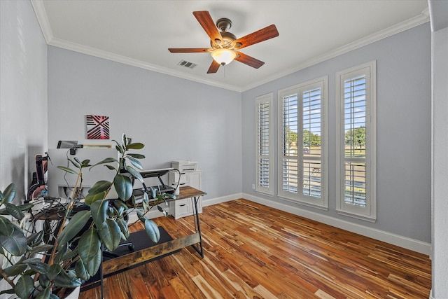 office space with crown molding, ceiling fan, and hardwood / wood-style flooring