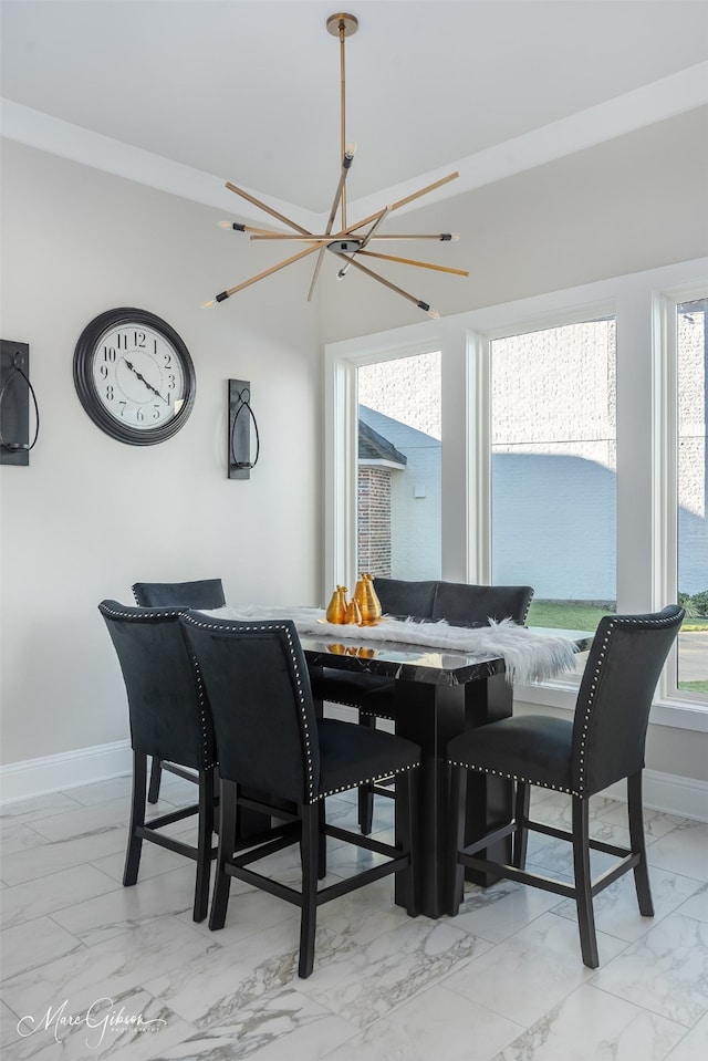 dining area with a notable chandelier and plenty of natural light