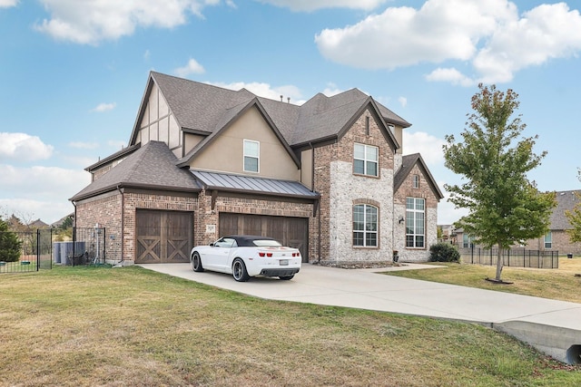 view of front of house featuring a garage and a front yard