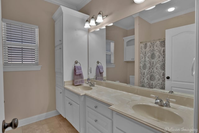 bathroom with vanity, ornamental molding, toilet, and tile patterned flooring