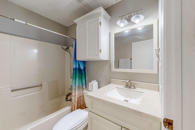 full bathroom with toilet, vanity, and shower / tub combo