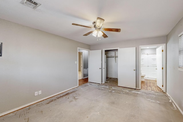 unfurnished bedroom with a closet, ceiling fan, and ensuite bathroom