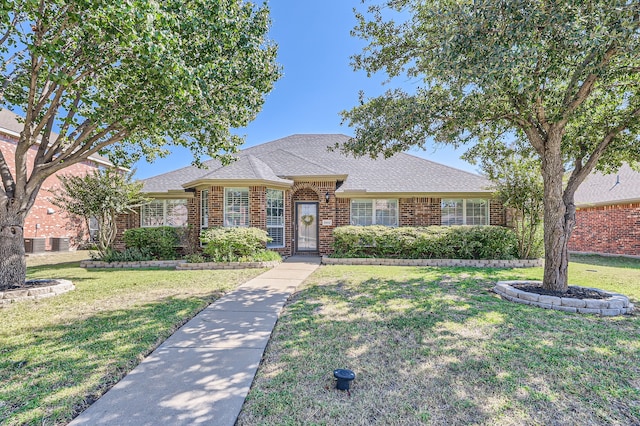 ranch-style home with a front yard