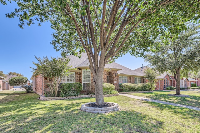 view of front of home with a front lawn