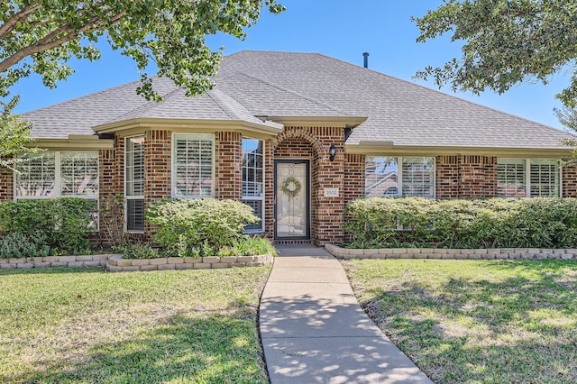 view of front of house with a front lawn