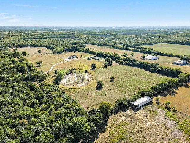 birds eye view of property featuring a rural view