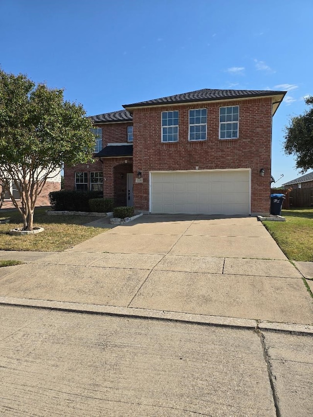 view of front of property featuring a garage