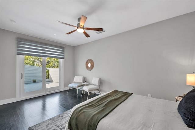 bedroom with dark hardwood / wood-style floors, access to exterior, and ceiling fan