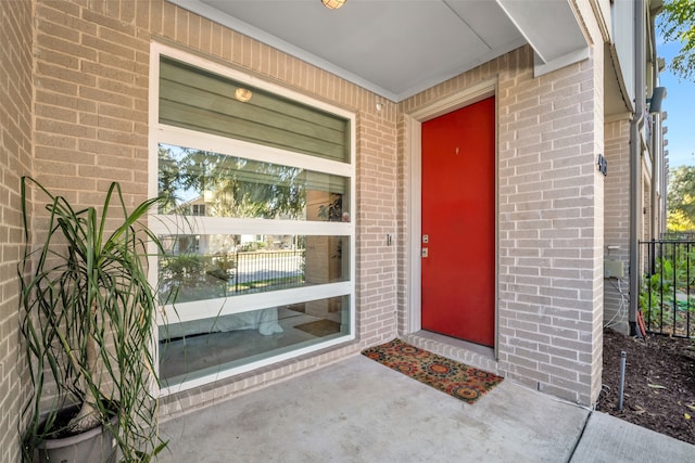 doorway to property featuring a patio