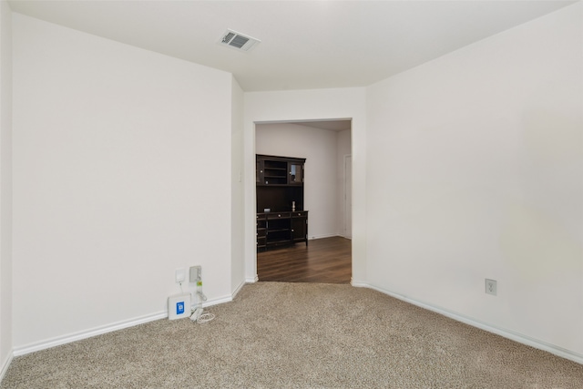 unfurnished room with carpet floors