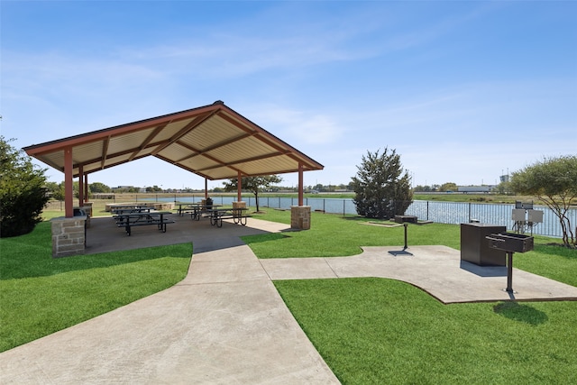 view of community with a gazebo, a patio area, and a yard