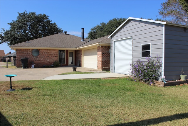 single story home with a garage and a front yard