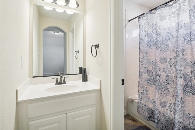 bathroom with vanity and shower / bath combo with shower curtain