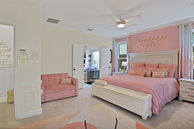 bedroom with light hardwood / wood-style floors, ensuite bathroom, ceiling fan, and ornamental molding