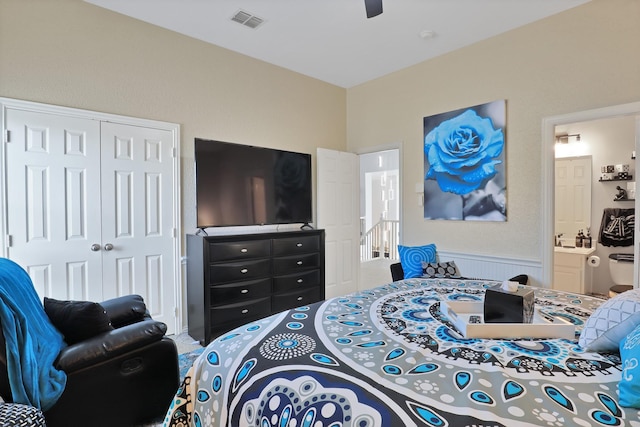 bedroom featuring connected bathroom, ceiling fan, and a closet