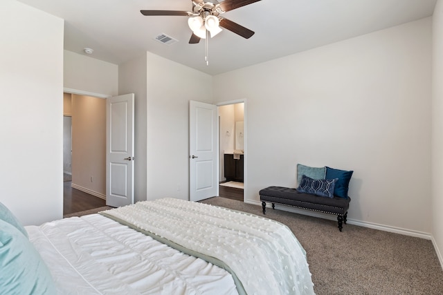 bedroom with dark colored carpet and ceiling fan